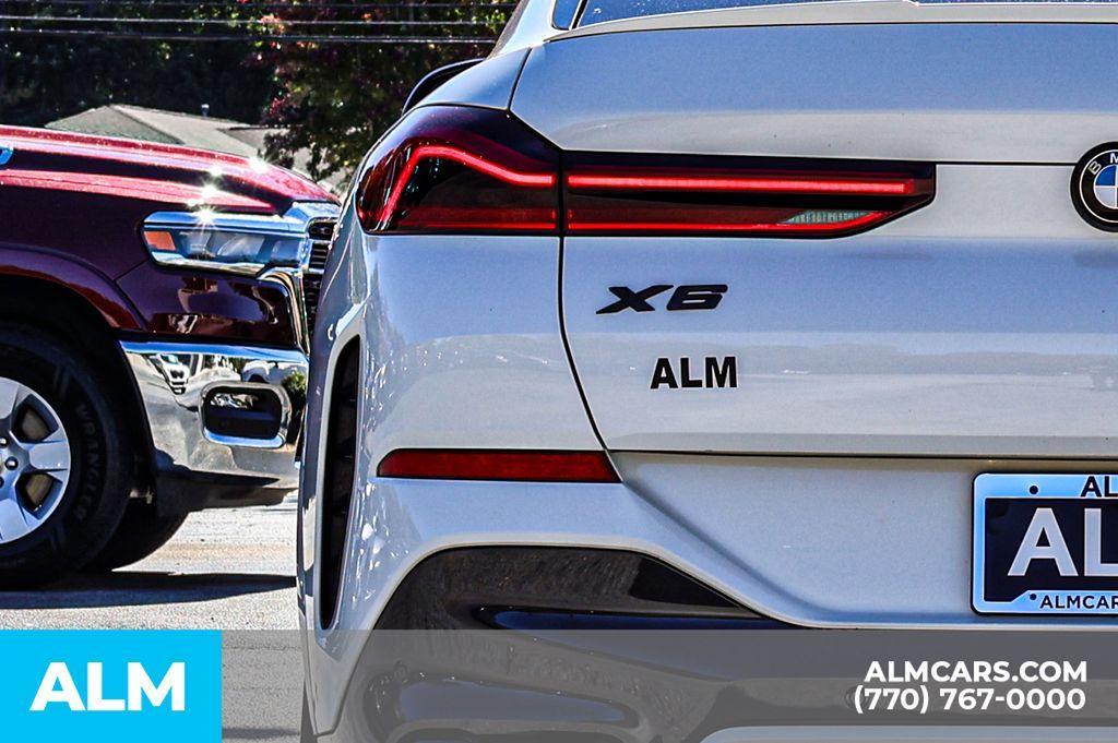 used 2023 BMW X6 car, priced at $45,220