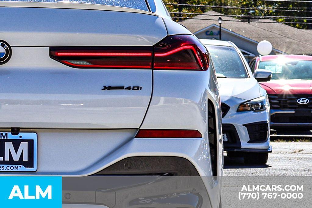 used 2023 BMW X6 car, priced at $45,220