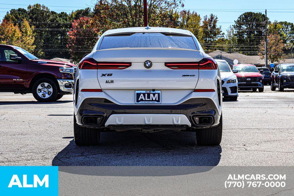 used 2023 BMW X6 car, priced at $45,220