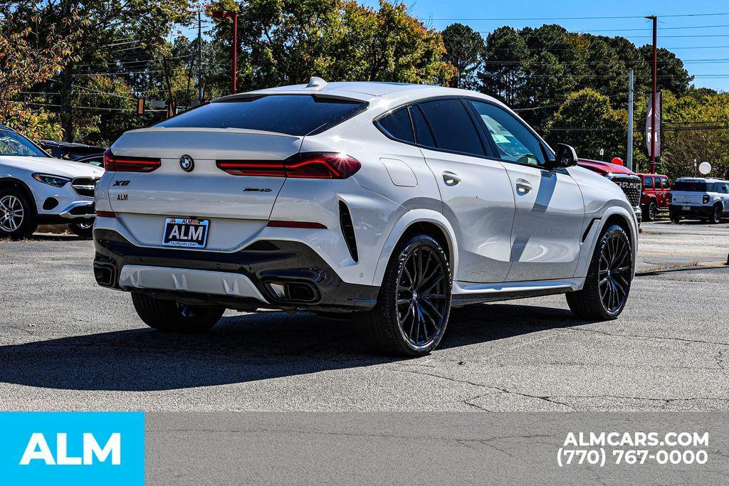 used 2023 BMW X6 car, priced at $45,220