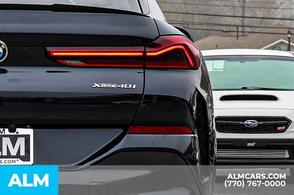 used 2022 BMW X6 car, priced at $49,670