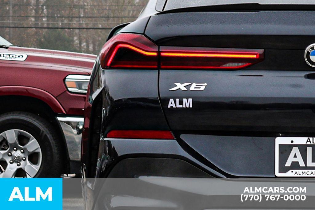 used 2022 BMW X6 car, priced at $49,670