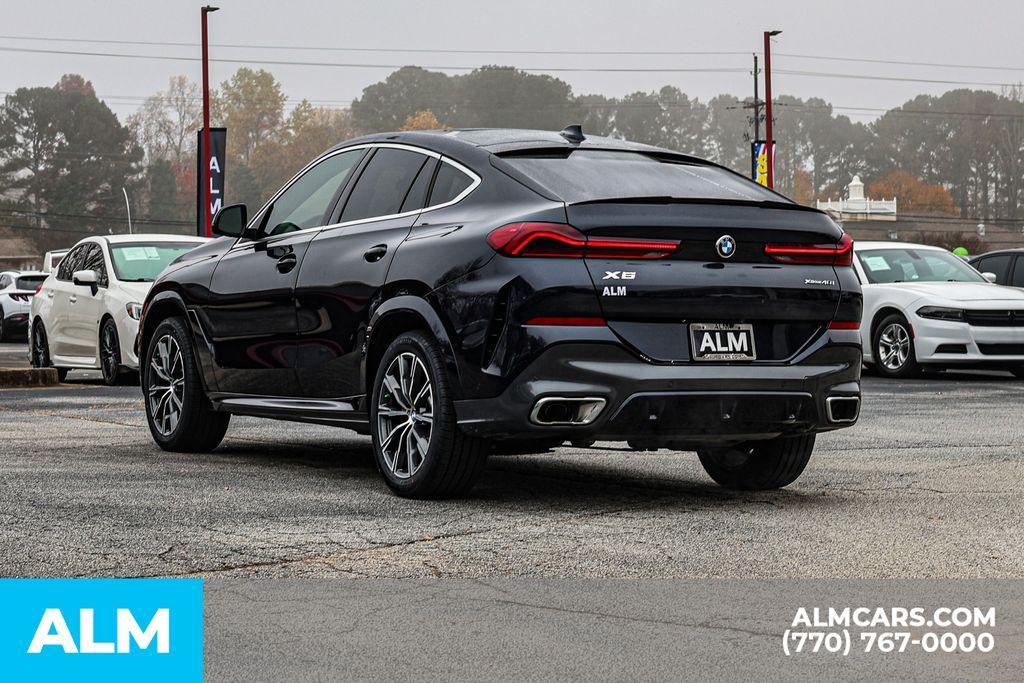used 2022 BMW X6 car, priced at $49,670
