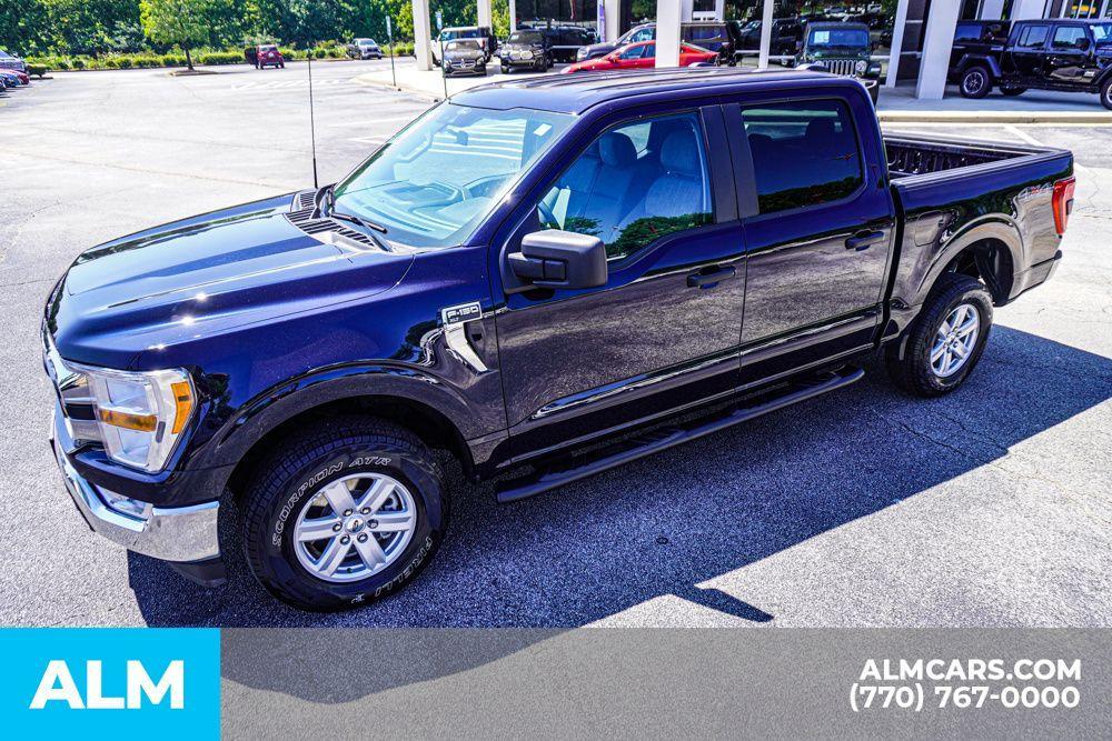 used 2021 Ford F-150 car, priced at $35,570