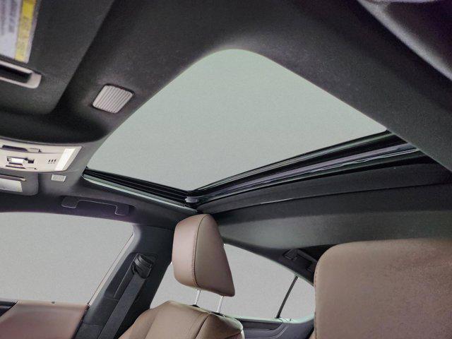 new 2025 Lexus ES 300h car, priced at $54,319