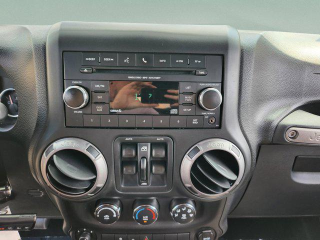 used 2014 Jeep Wrangler Unlimited car, priced at $16,708