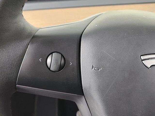 used 2024 Tesla Model Y car, priced at $33,810