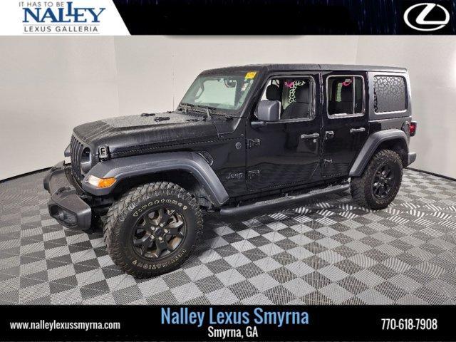 used 2023 Jeep Wrangler car, priced at $34,990