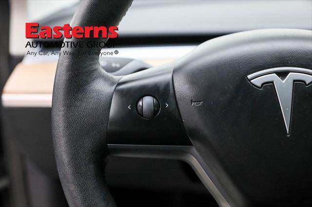 used 2023 Tesla Model 3 car, priced at $27,950