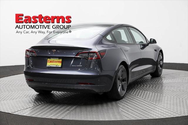used 2023 Tesla Model 3 car, priced at $27,950