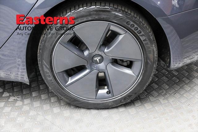used 2023 Tesla Model 3 car, priced at $27,950