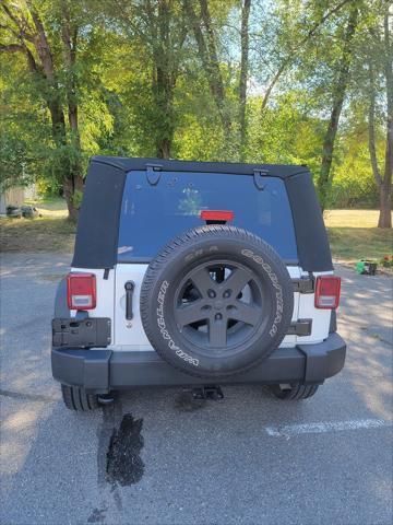 used 2016 Jeep Wrangler Unlimited car, priced at $22,995