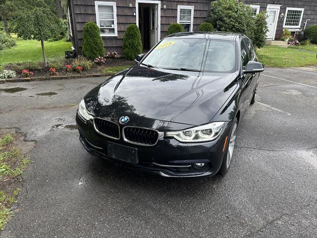 used 2018 BMW 330 car, priced at $17,500