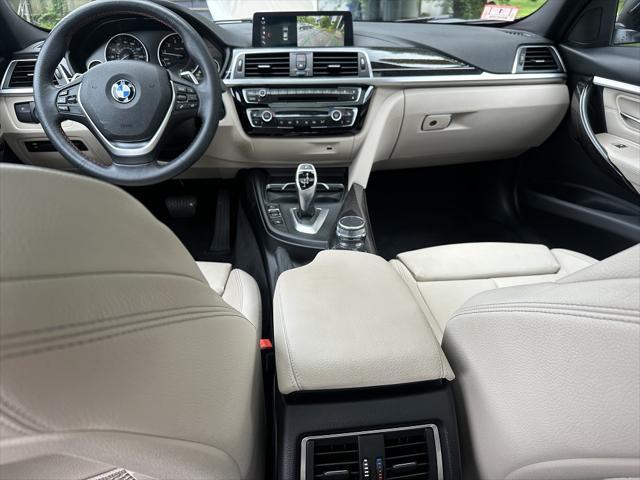 used 2018 BMW 330 car, priced at $17,500