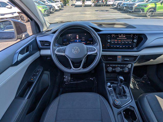 used 2024 Volkswagen Taos car, priced at $24,700