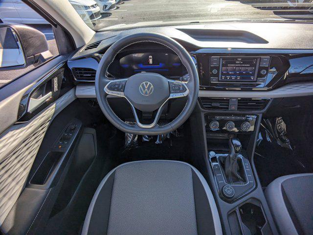 used 2024 Volkswagen Taos car, priced at $22,400