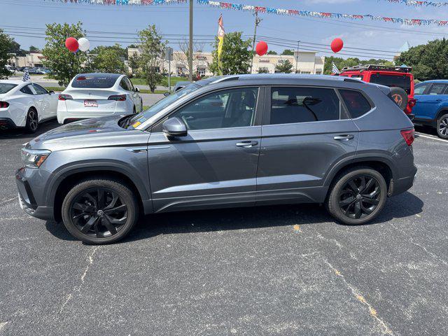 used 2023 Volkswagen Taos car, priced at $21,686