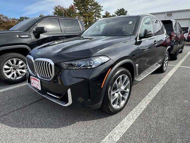 used 2025 BMW X5 PHEV car, priced at $50,000