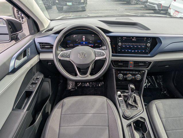 used 2024 Volkswagen Taos car, priced at $22,222