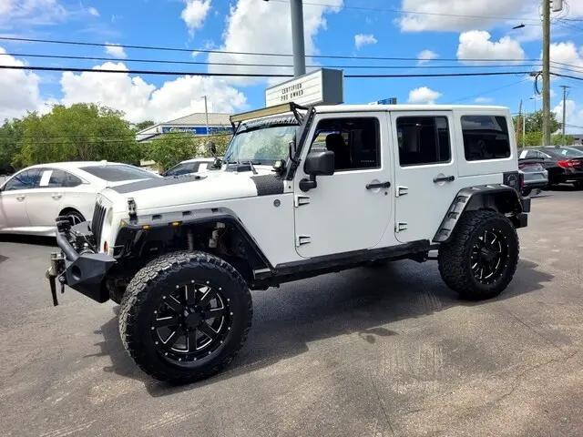used 2013 Jeep Wrangler Unlimited car, priced at $10,925