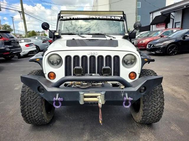 used 2013 Jeep Wrangler Unlimited car, priced at $10,925