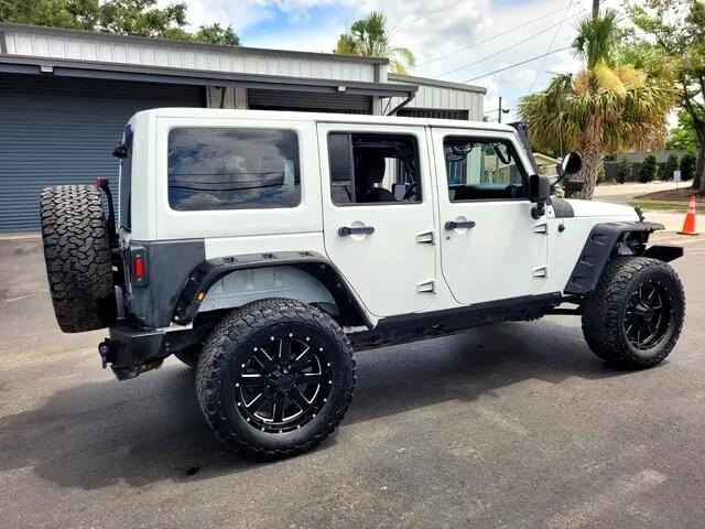 used 2013 Jeep Wrangler Unlimited car, priced at $10,925