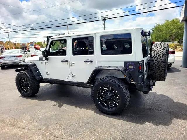 used 2013 Jeep Wrangler Unlimited car, priced at $10,925