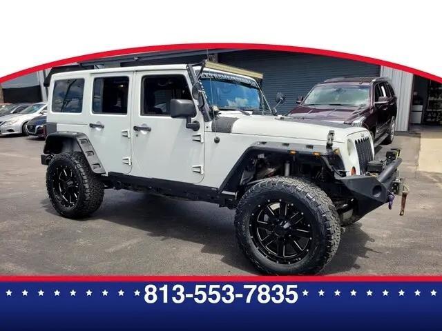 used 2013 Jeep Wrangler Unlimited car, priced at $10,925