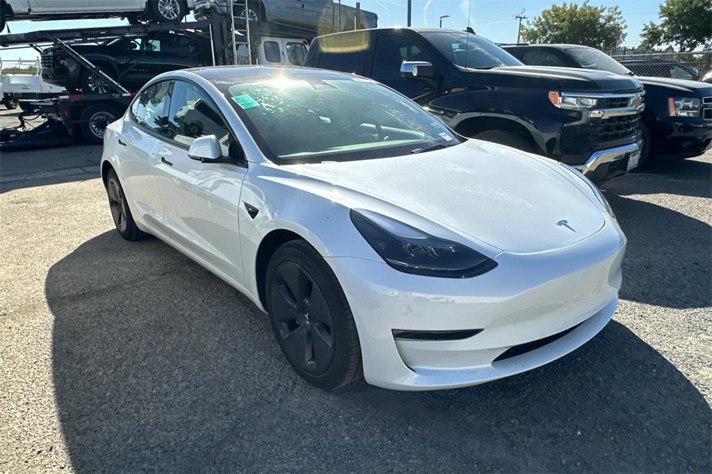 used 2023 Tesla Model 3 car, priced at $27,795