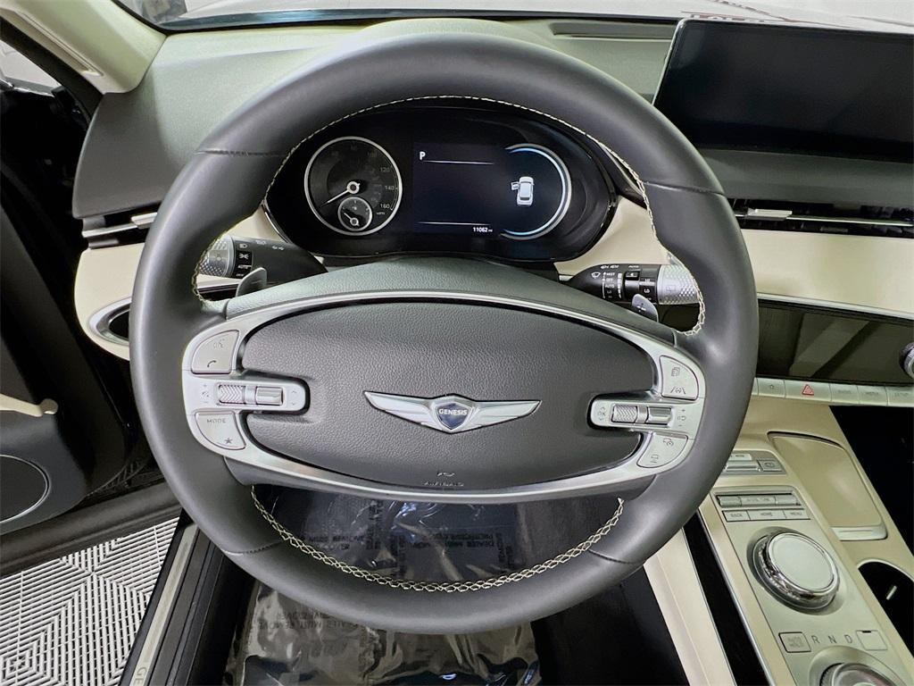 used 2025 Genesis GV70 car, priced at $43,995