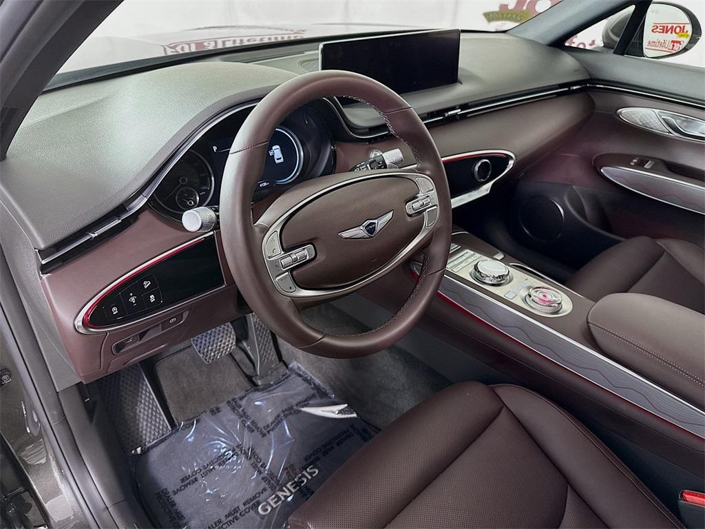 used 2025 Genesis GV70 car, priced at $43,998