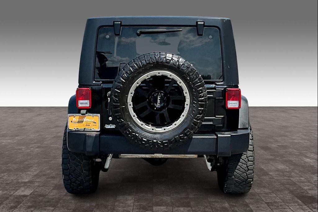 used 2014 Jeep Wrangler Unlimited car, priced at $11,998