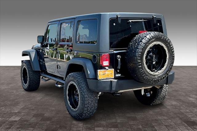 used 2014 Jeep Wrangler Unlimited car, priced at $14,958