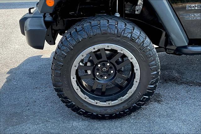 used 2014 Jeep Wrangler Unlimited car, priced at $14,958