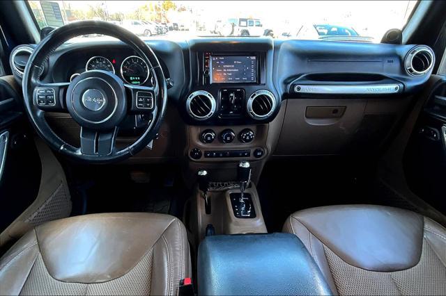 used 2013 Jeep Wrangler Unlimited car, priced at $16,400