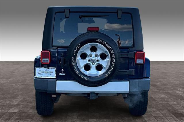 used 2013 Jeep Wrangler Unlimited car, priced at $16,400