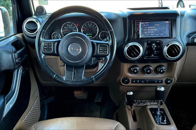 used 2013 Jeep Wrangler Unlimited car, priced at $16,400