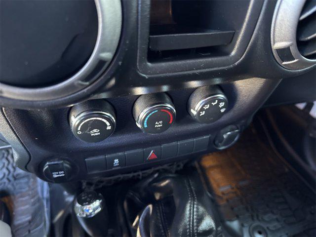 used 2015 Jeep Wrangler car, priced at $15,514