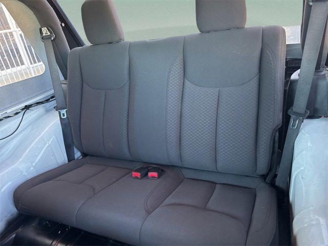 used 2015 Jeep Wrangler car, priced at $13,713