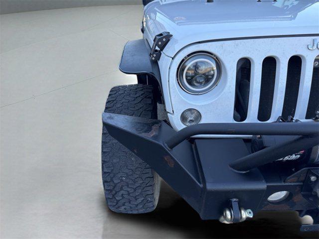 used 2015 Jeep Wrangler car, priced at $13,713