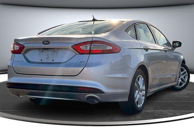 used 2016 Ford Fusion car, priced at $7,000