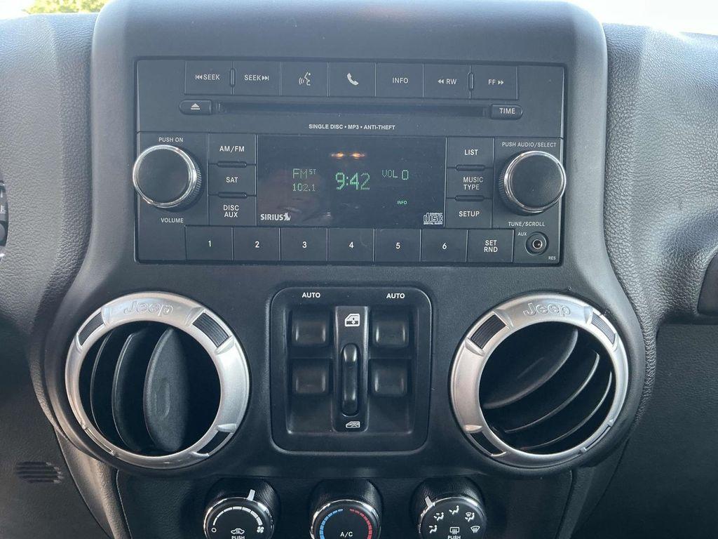 used 2015 Jeep Wrangler Unlimited car, priced at $23,500