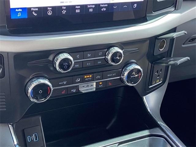 used 2023 Ford F-150 Lightning car, priced at $38,299