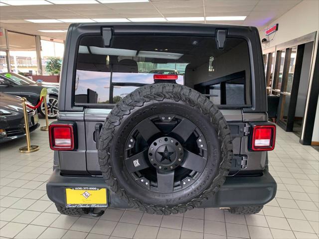 used 2023 Jeep Wrangler car, priced at $33,988