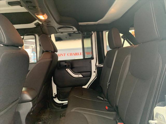 used 2014 Jeep Wrangler Unlimited car, priced at $25,988