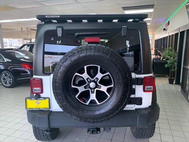 used 2014 Jeep Wrangler Unlimited car, priced at $25,988