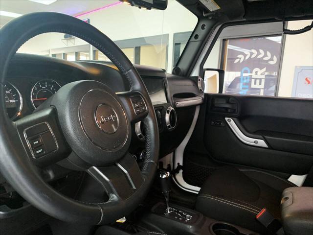 used 2014 Jeep Wrangler Unlimited car, priced at $25,988