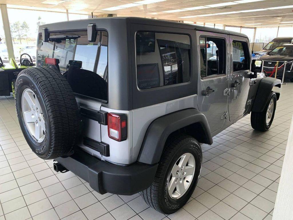 used 2013 Jeep Wrangler Unlimited car, priced at $15,986