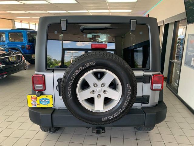used 2013 Jeep Wrangler Unlimited car, priced at $16,988