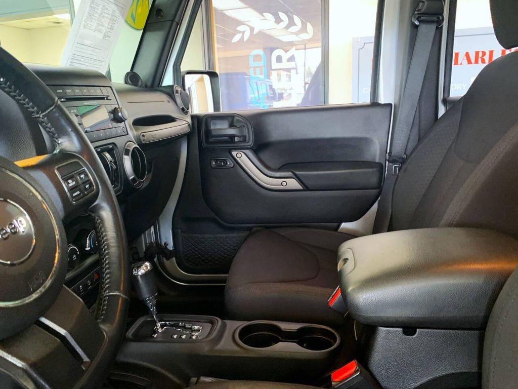 used 2013 Jeep Wrangler Unlimited car, priced at $15,986